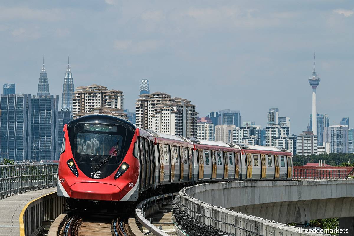 Public transport services that currently use Touch 'n Go as a mode of payment include Prasarana bus services, the Light Rail Transit (LRT), Mass Rapid Transit (MRT) as pictured, and Keretapi Tanah Melayu Bhd (KTMB). (Photo by Zahid Izzani Mohd Said/The Edge)